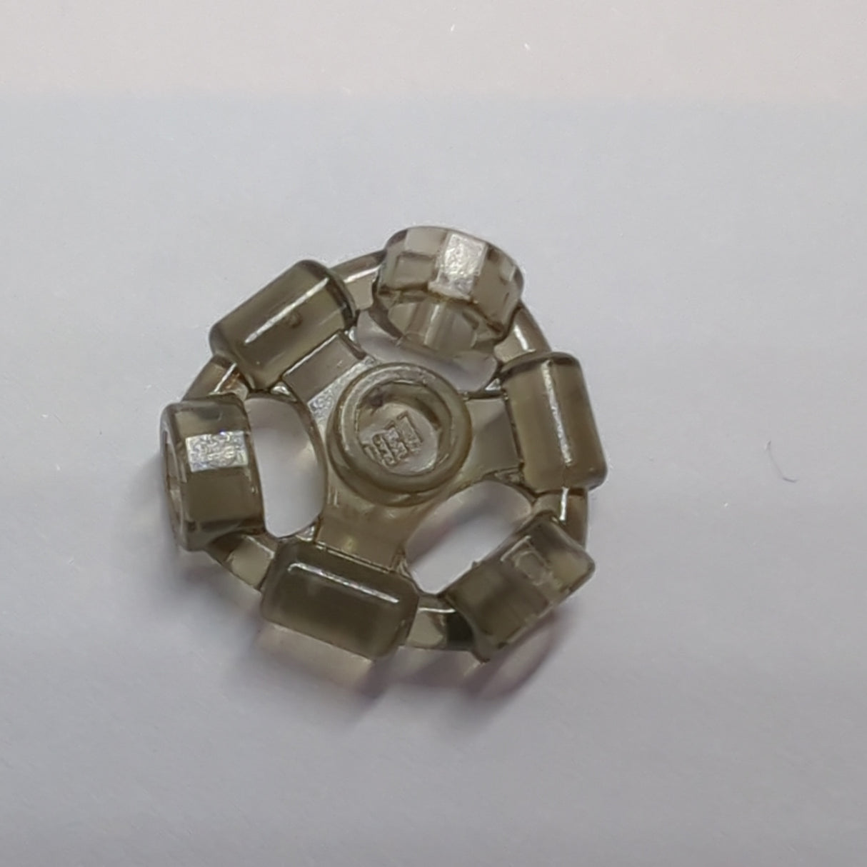 Minifig, Waffe Halterring mit 3 Noppen, transparent schwarz trans black