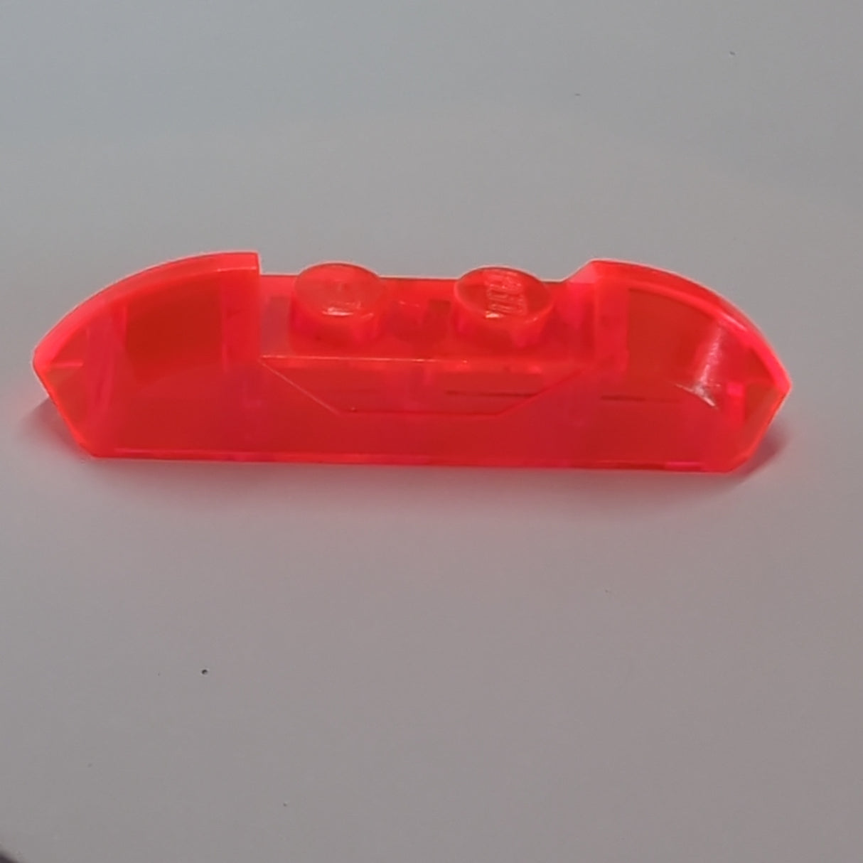 4x1 Dachstein gebogen mit zwei Noppen transparent neonorange trans-neon orange