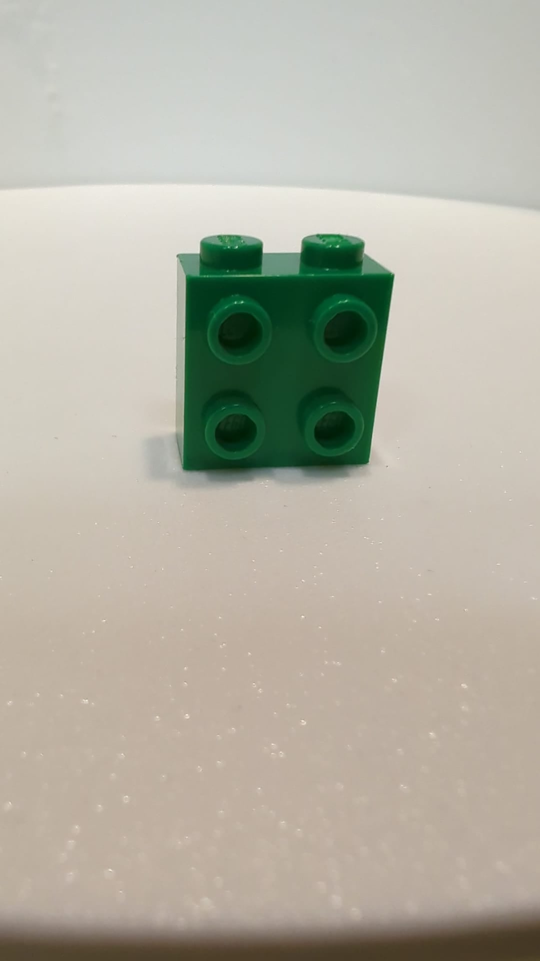 NEU Stein, modifiziert 1x2x1 2/3 mit Noppen an einer Seite grün