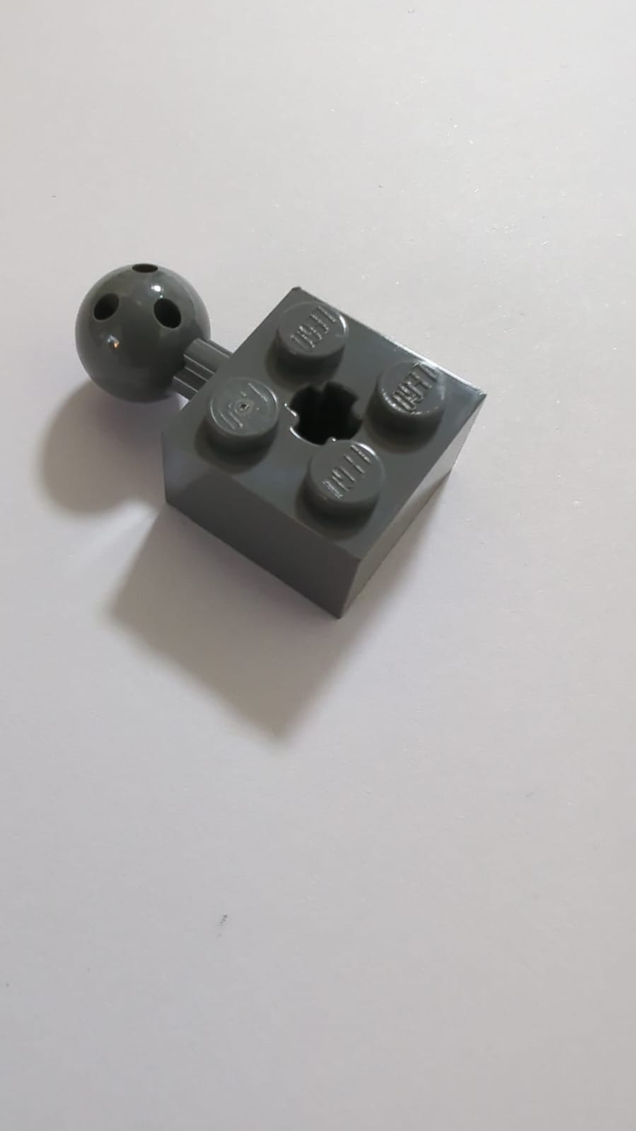 NEU Technic, Brick Modified 2 x 2 with Ball Joint and Axle Hole with 6 Holes in Ball neudunkelgrau