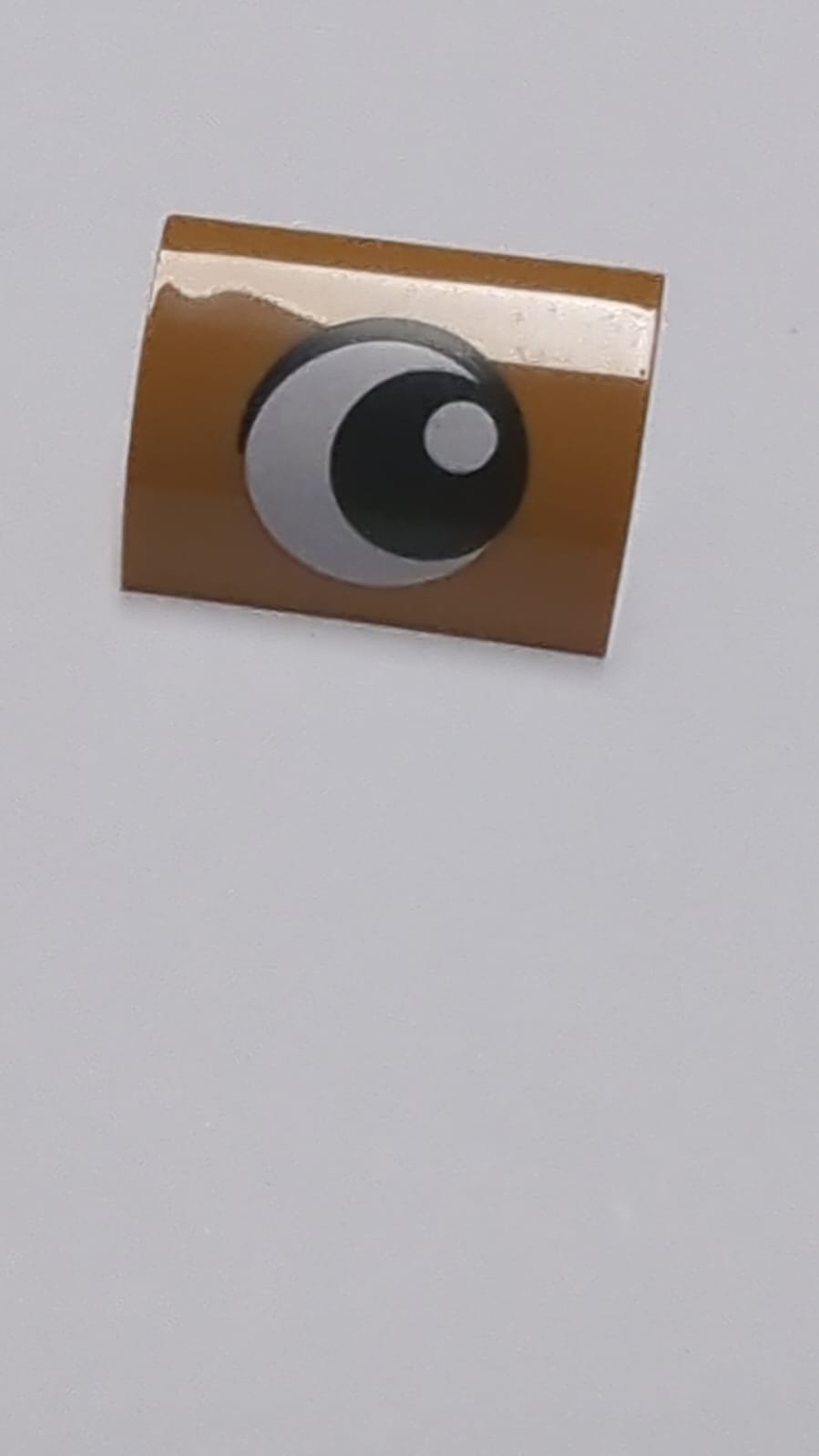 NEU Schräge, Gebogen 1 x 2 mit unterem Noppenhalter mit schwarzem und weißem Auge, das nach links schaut nougat (medium)