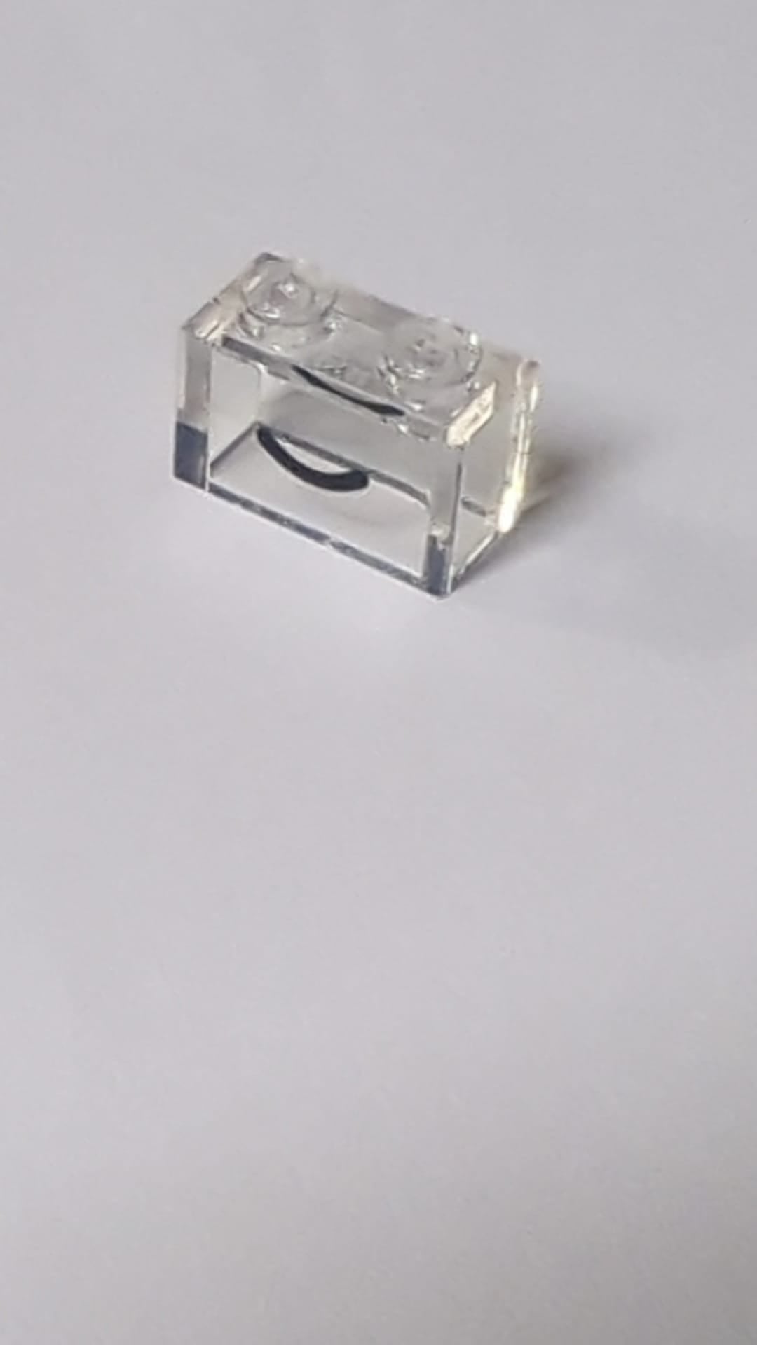 NEU Stein 1 x 2 ohne Bodentube mit schwarzem Lächeln und gebogenem Linienmuster transparent weiß