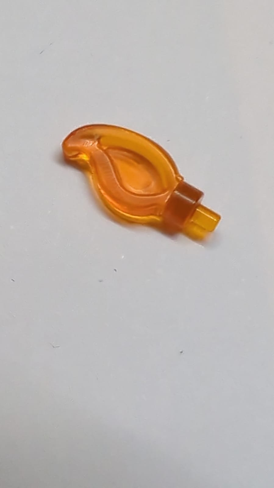 Welle abgerundet gerade Einzelkante mit kleinem Stiftende (Kerzenflamme) transparent orange