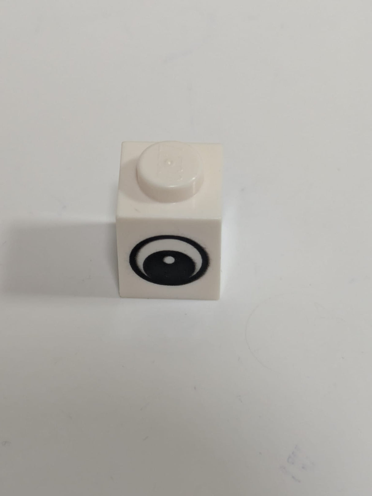 1x1 Stein mit Muster: schwarz-weißes Auge mit Pupille weiß