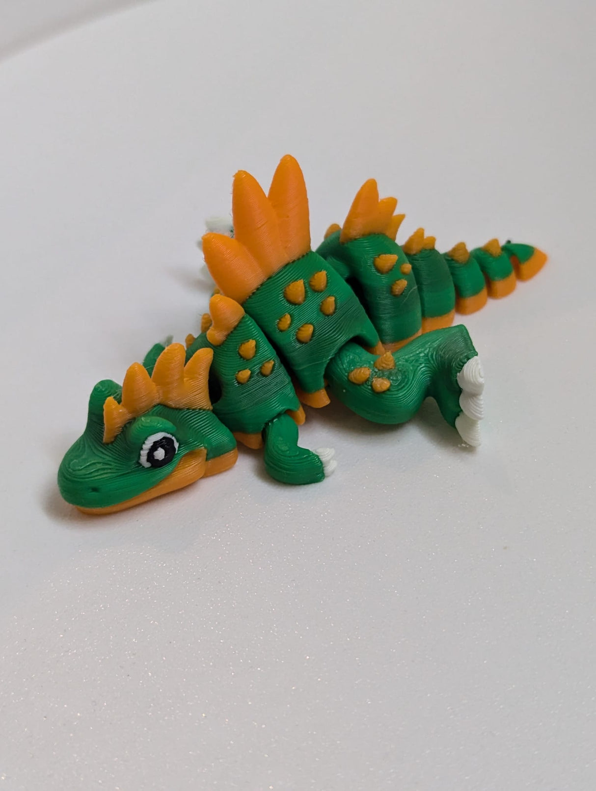 Flexibler Spinosaurus liegen und stehen 3D grün orange