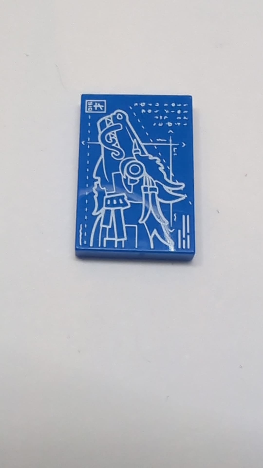 2x3 Fliese mit weißem Drachenkopf-Bauplanmuster blau