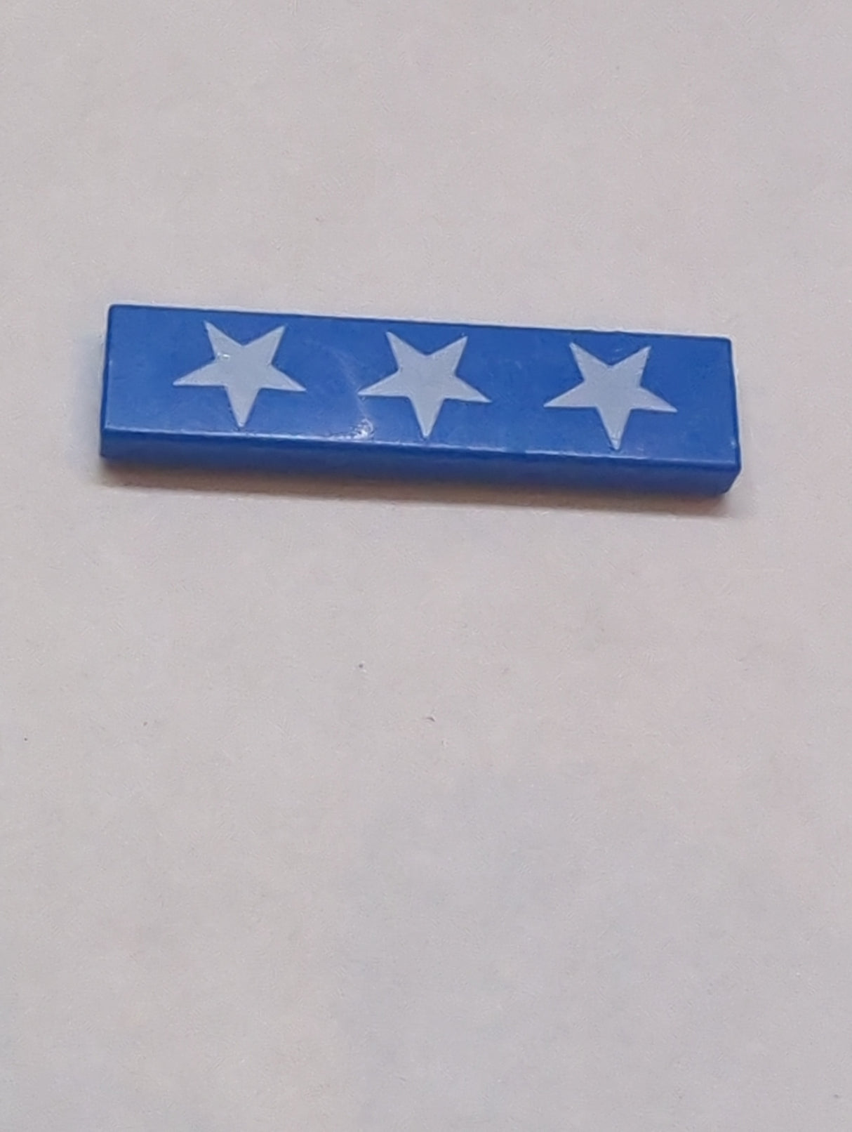 1x4 Fliese bedruckt mit 3 White Stars Pattern blau