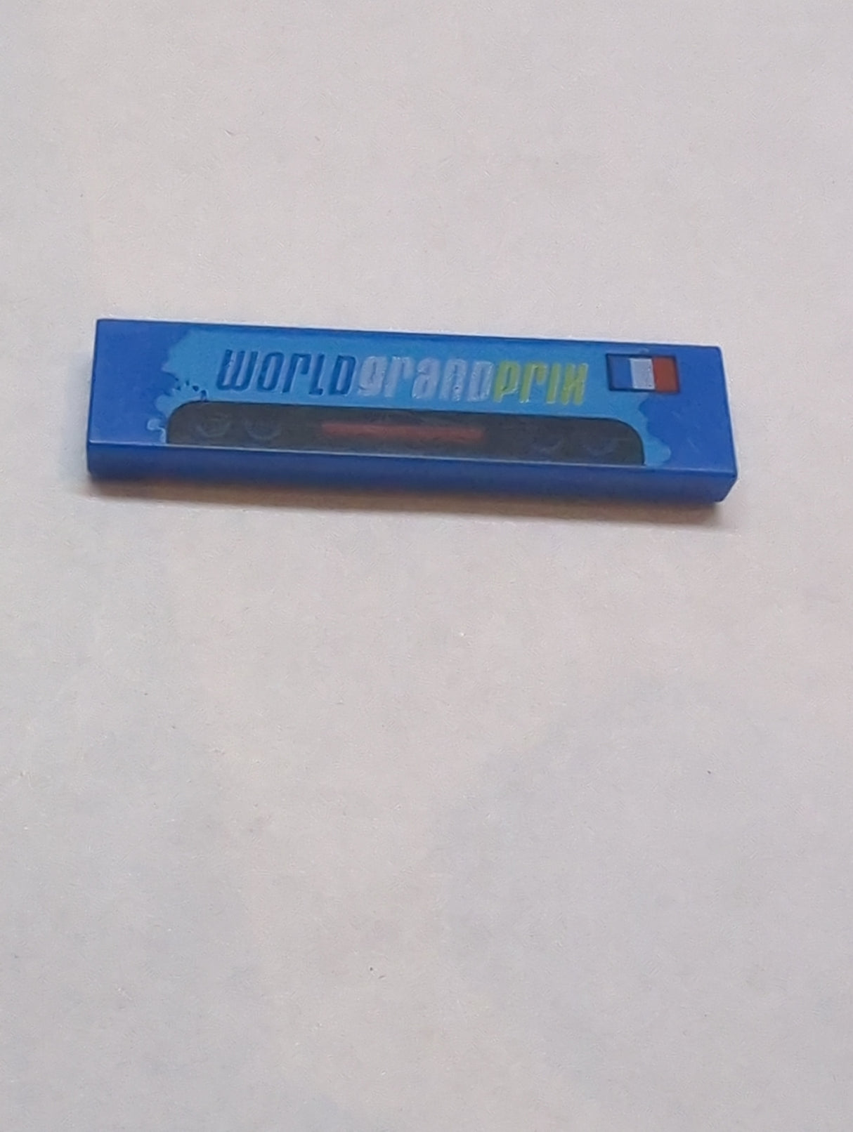 1x4 Fliese bedruckt mit 'WORLD GRAND PRIX' and French Flag Pattern blau