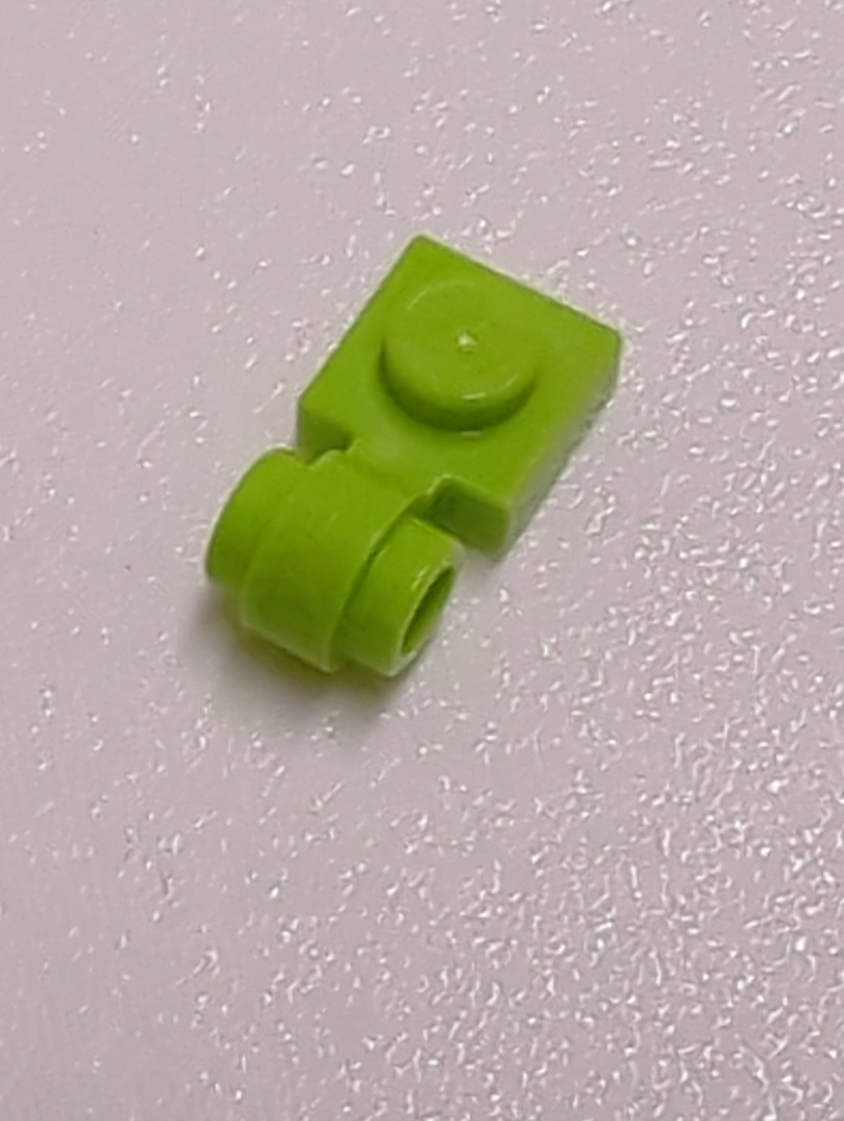 NEU Plate, Modified 1 x 1 with Light Attachment - Thick Ring lindgrün