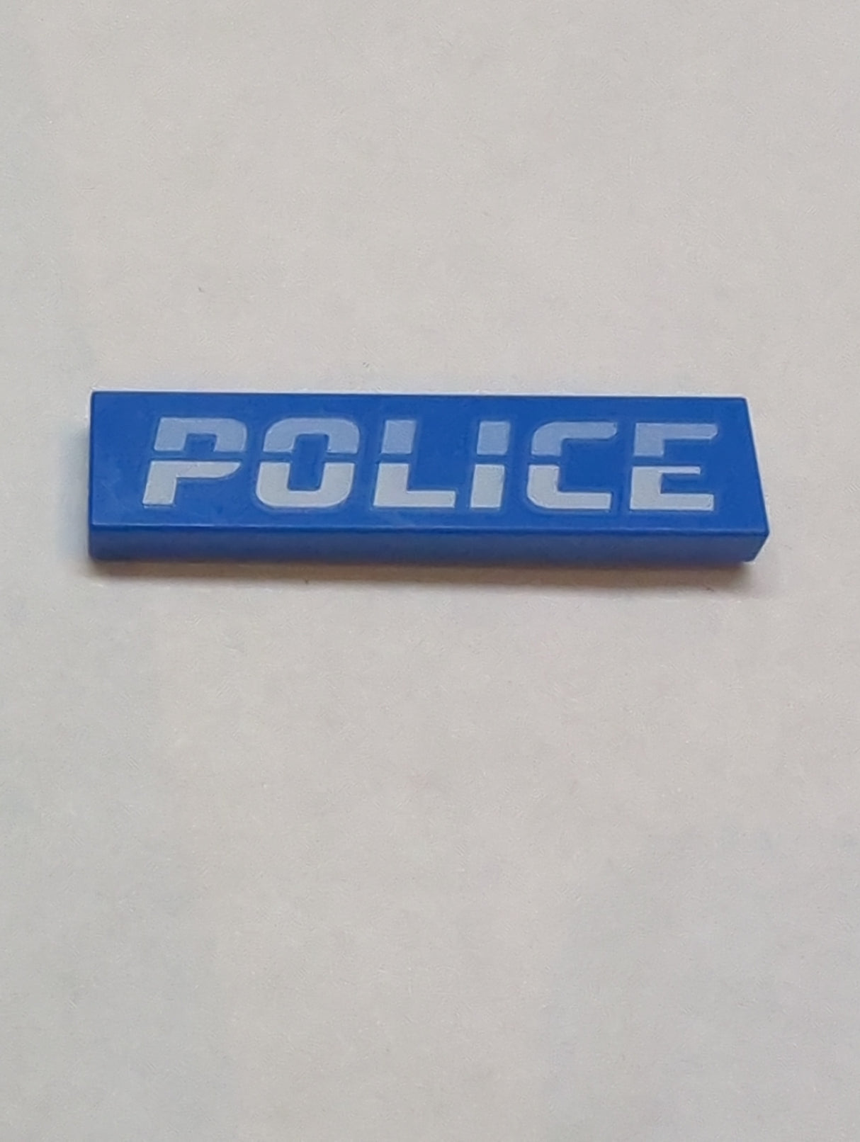 1x4 Fliese bedruckt mit Bright Light Blue and White 'POLICE' Pattern blau