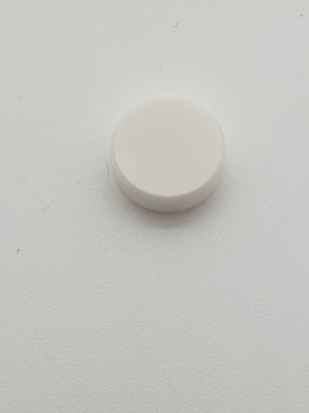 1x1 Fliese rund weiß white