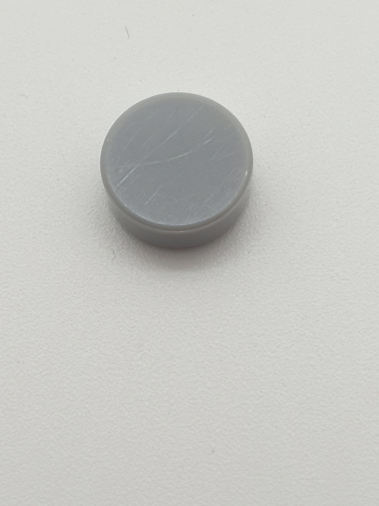 1x1 Fliese rund neuhellgrau