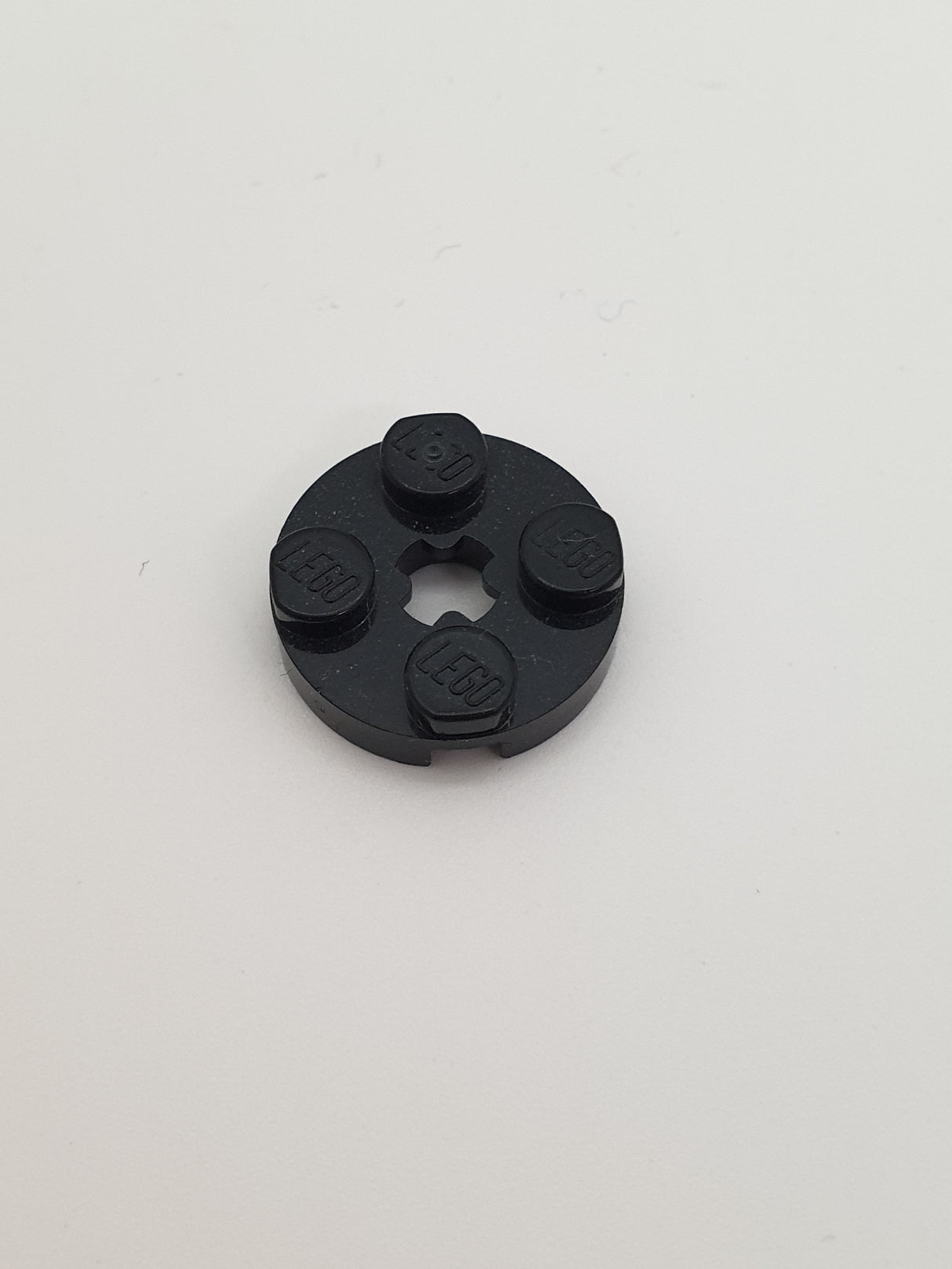 2x2 Rundplatte mit Achsenloch (+) schwarz black