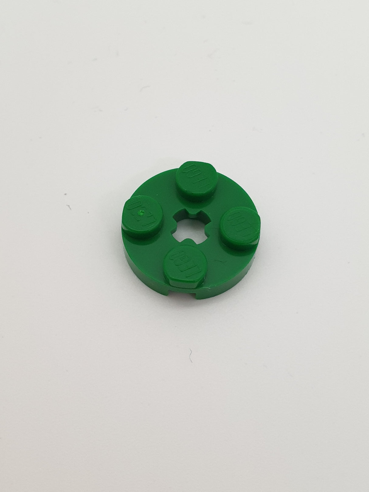 2x2 Rundplatte mit Achsenloch (+) grün