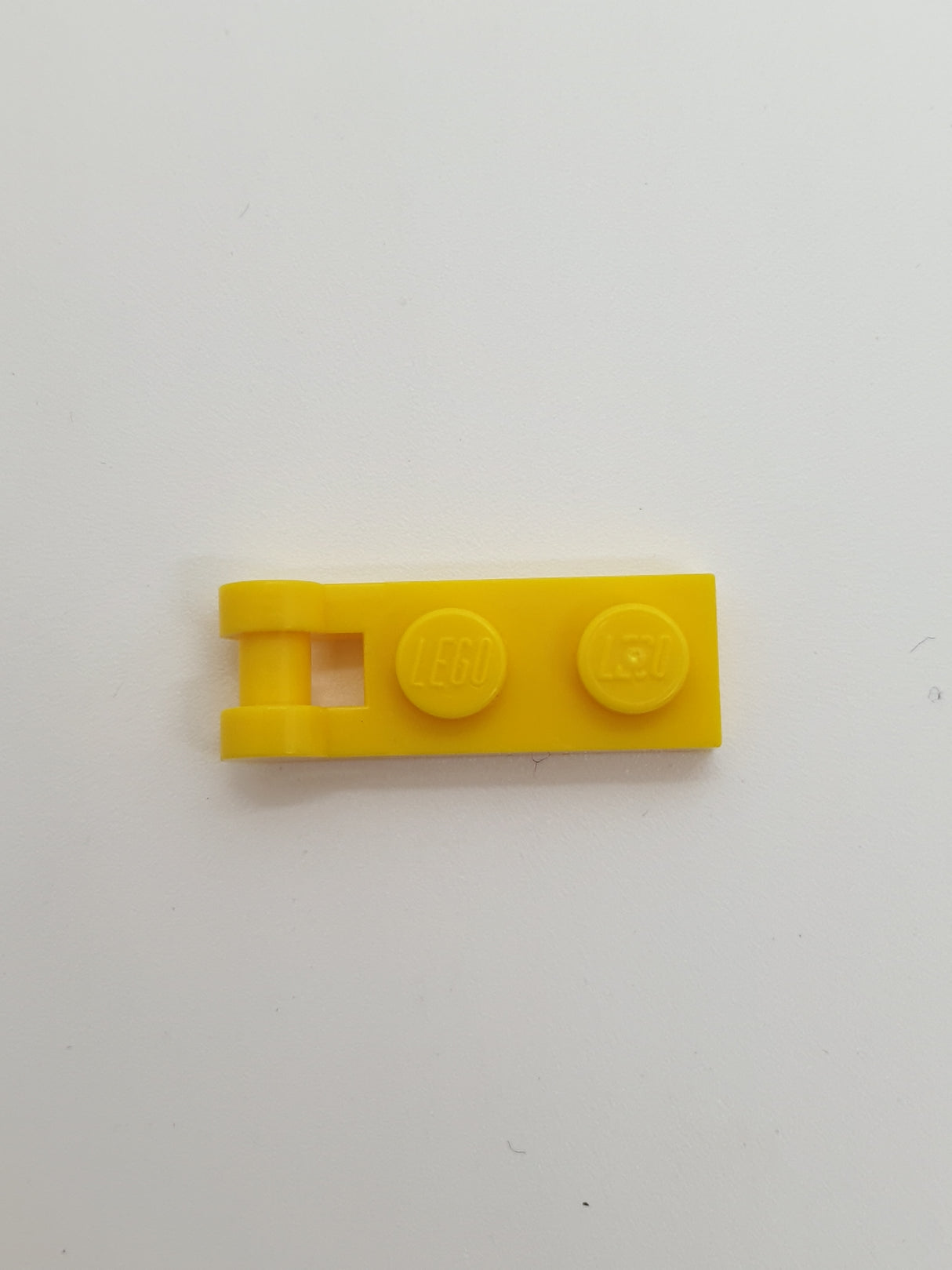 1x2 modifizierte Platte mit Halter/Griff gelb