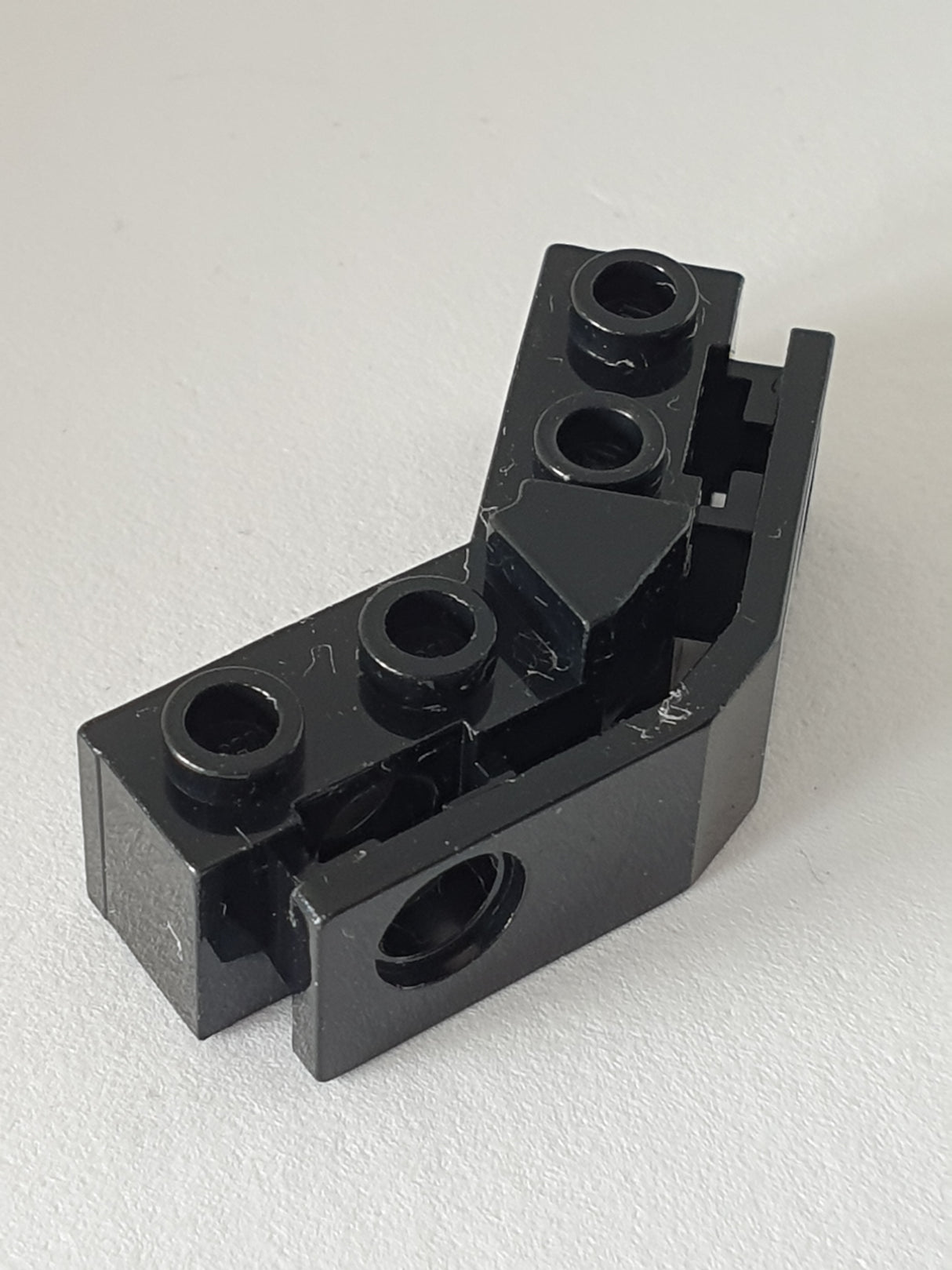 1x2-1x2 Technik Stein gebogen mit Gummihalter schwarz black