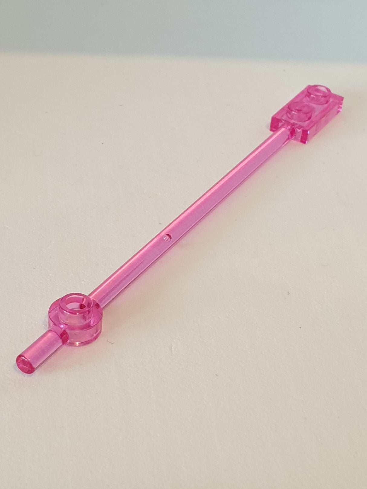 Stange 12L mit 1x2 Platte und 1x1 Rundplatte hohle Noppen transparent pink