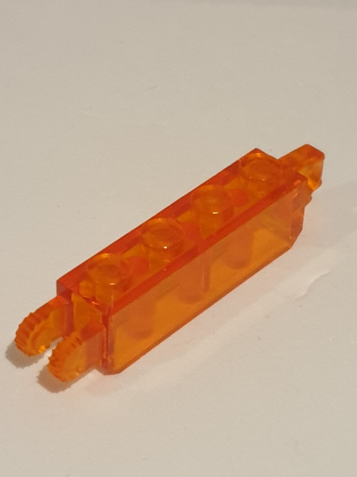 1x4 Scharnierstein mit Fingern an beiden Enden transparent orange