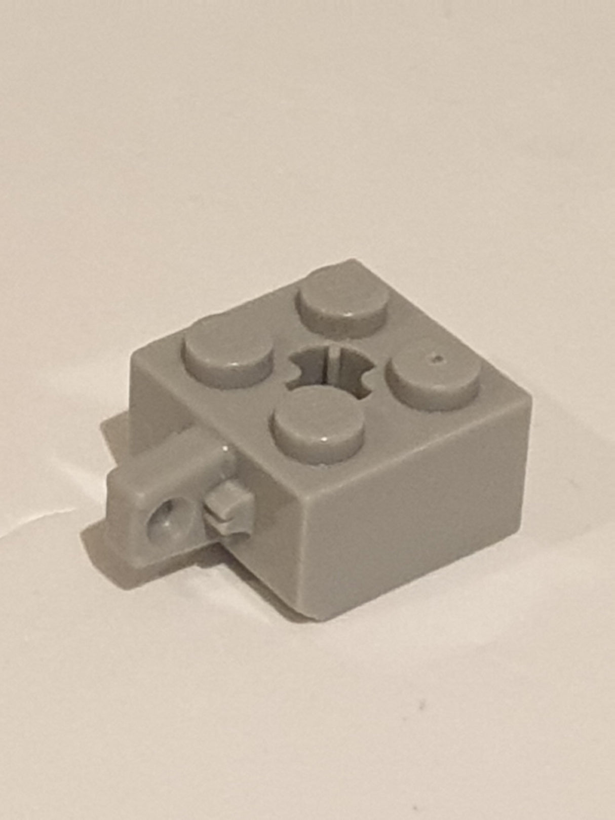 2x2 Scharnierstein mit 1 Fingern Kreuzloch x Achsloch neuhellgrau