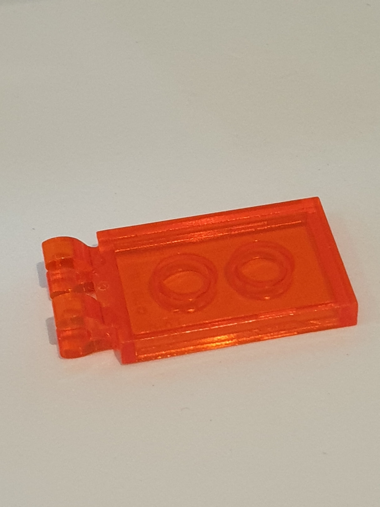 2x3 modifizierte Fliese mit 2 O-Clips transparent neonorange
