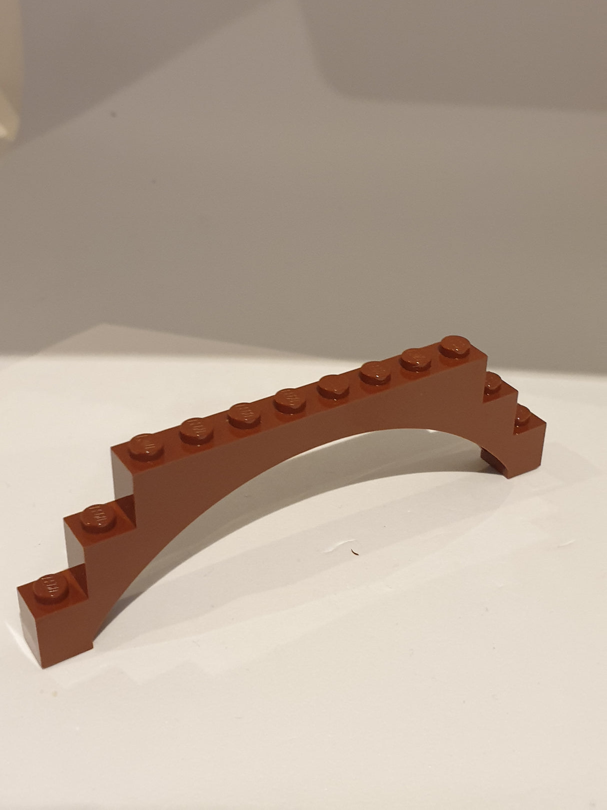 1x12x3 Bogenstein mit Stufen, ohne Absatz, ein Support neubraun reddish brown