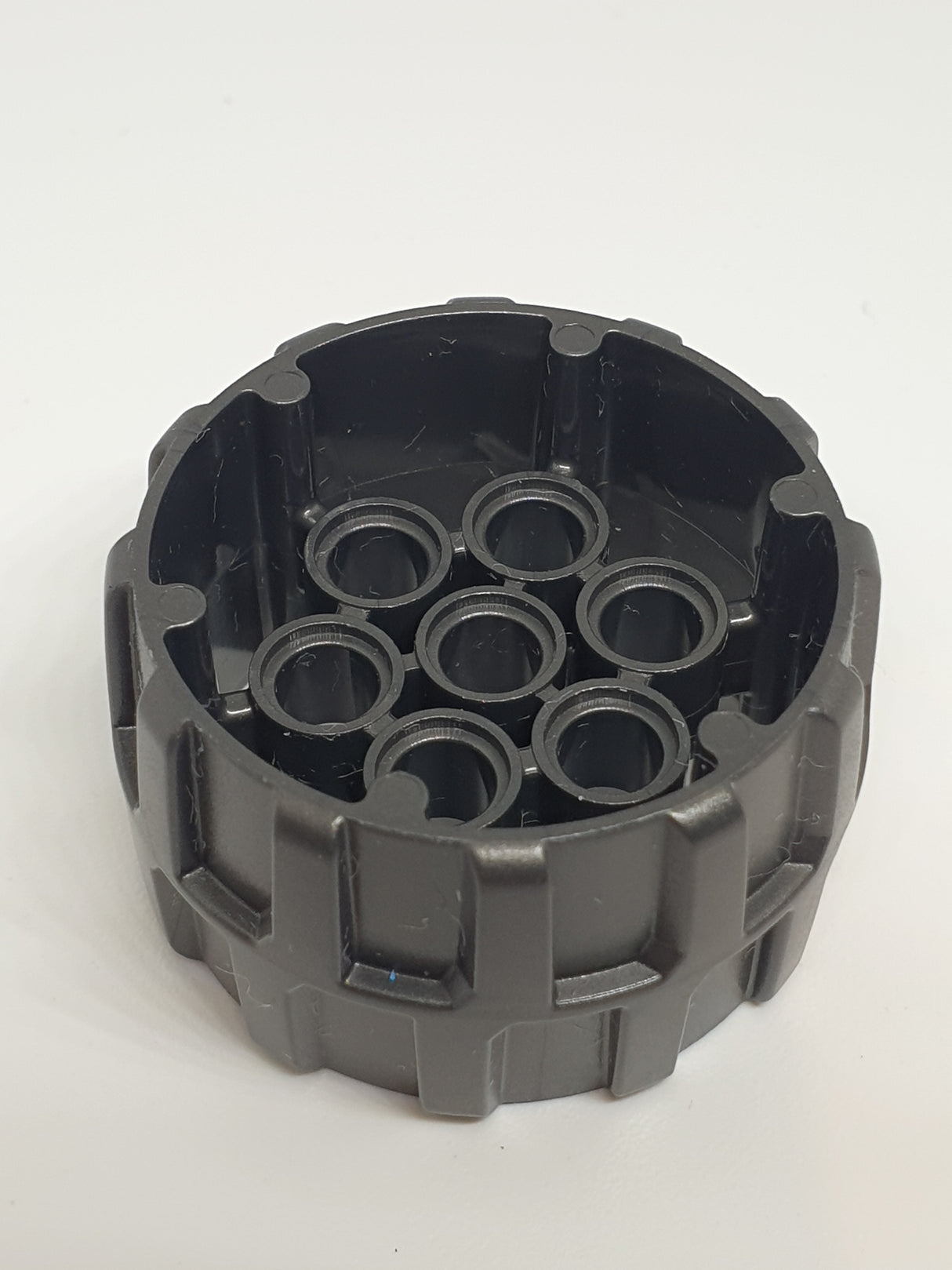 Rad aus Hartplastik 37x22mm mit 7 Pinlöchern titan