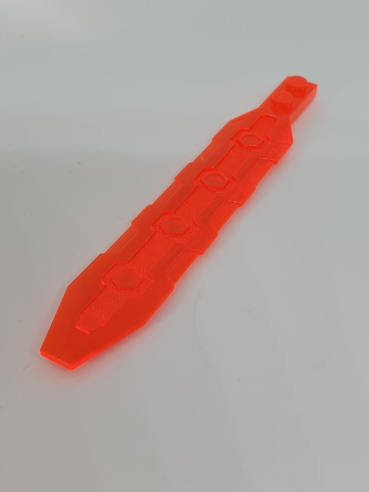 1x13 modifizierte Platte Schwert mit abgewinkelten Seiten, Sechsecke transparent neonorange