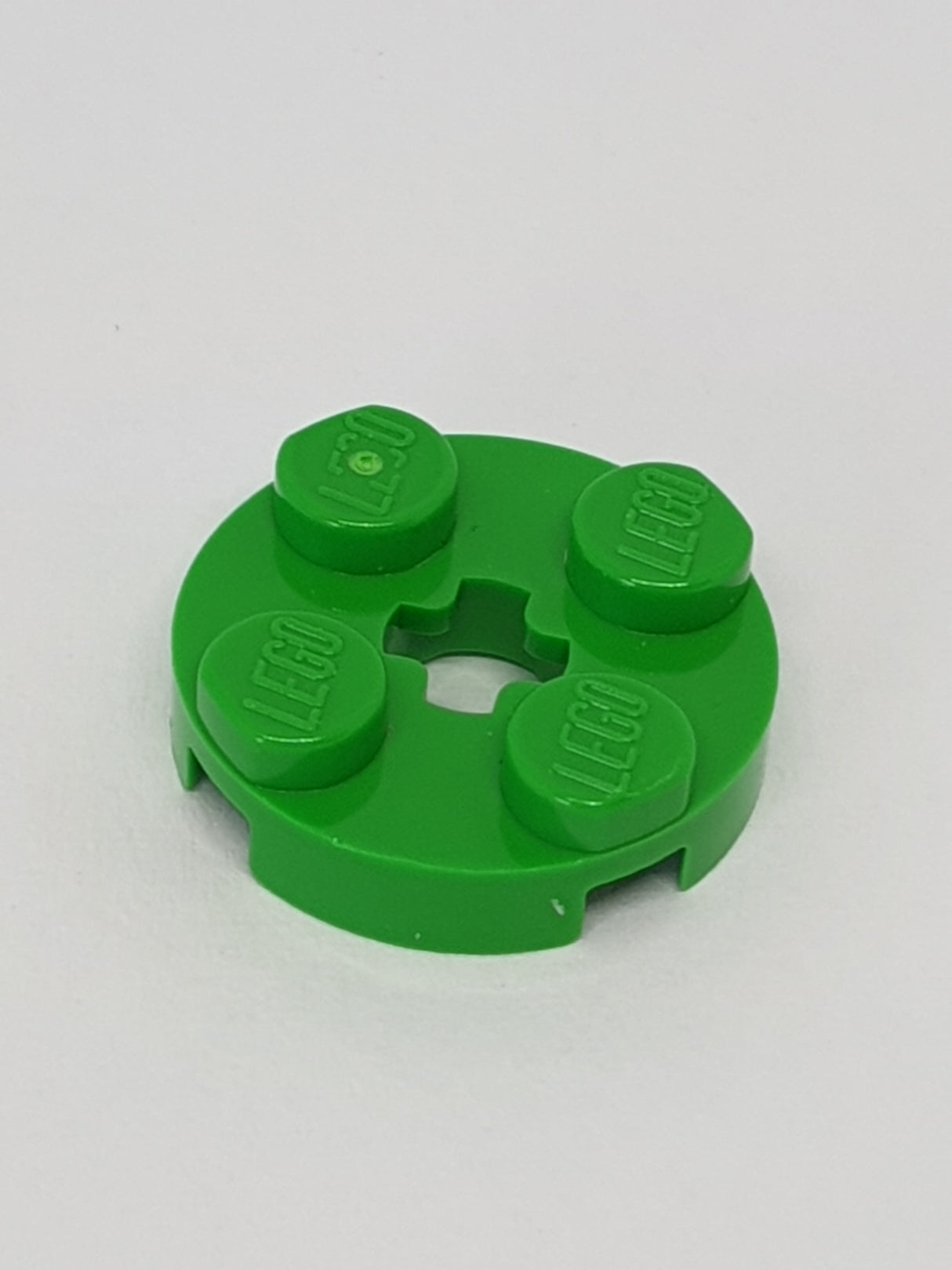 2x2 Rundplatte mit Achsenloch (+) mediumgrün