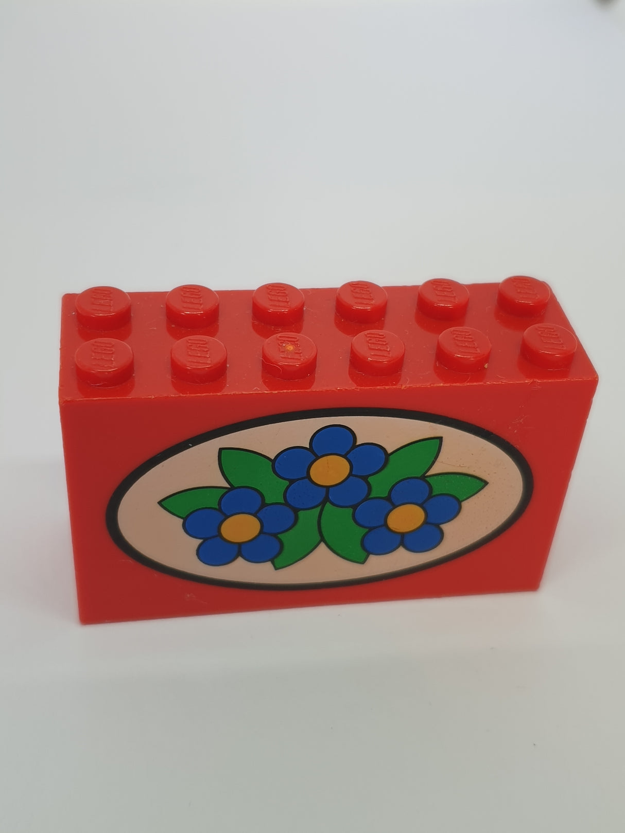 2x6x3 Stein bedruckt mit blauen Blumen rot