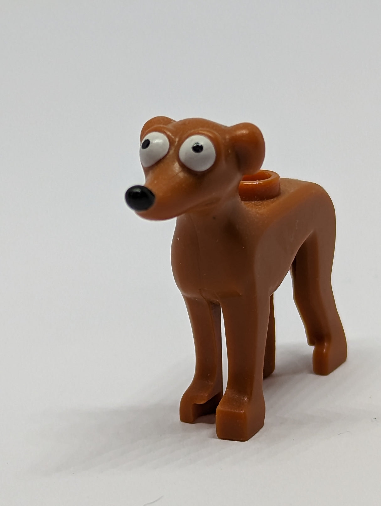 Simpsons Hund (Santas little Helper) mit schwarzer Nase und weissen Augen bedruckt, dunkelorange dark orange