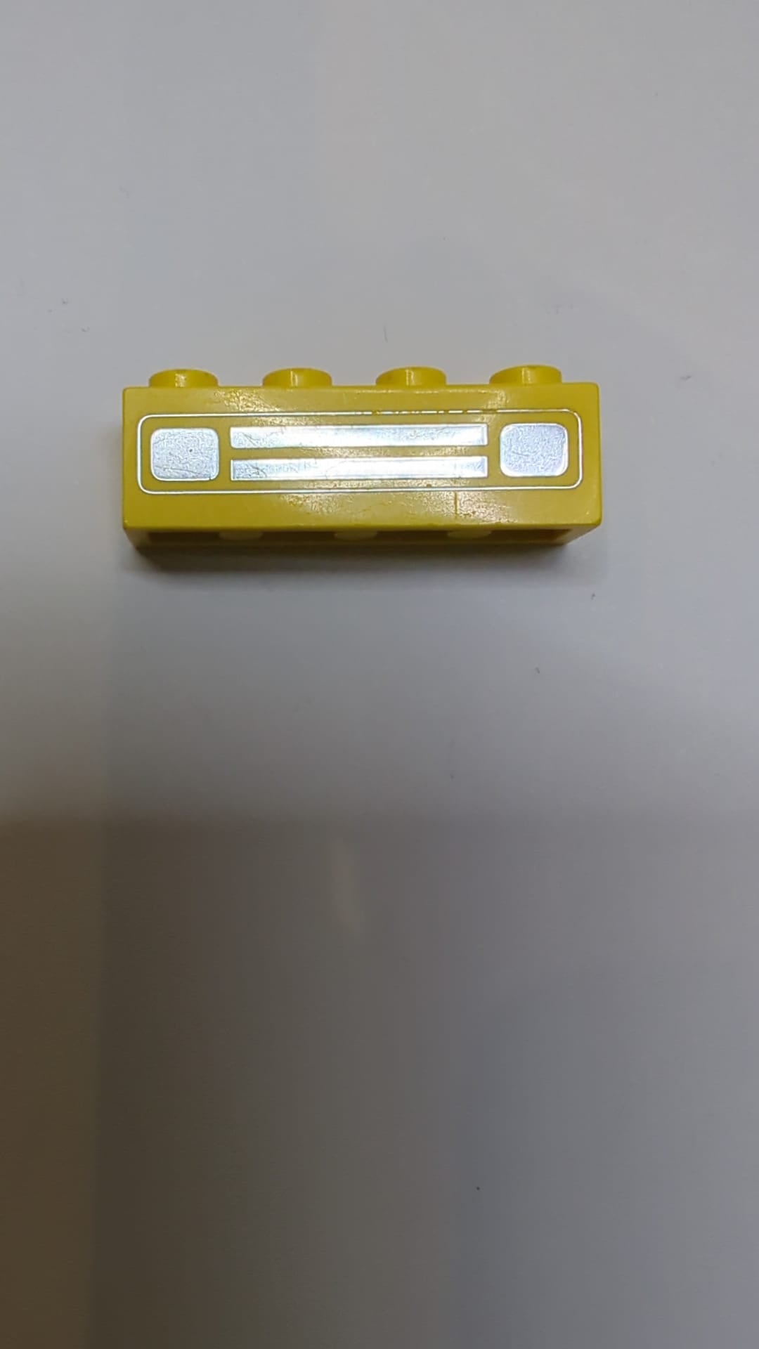 1x4 Stein mit Autogrill-Chrommuster (geprägter Druck) gelb