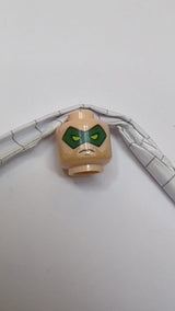 Minifigur, Kopf, doppelseitige grüne Augenmaske mit Augenlöchern, Grinsen-/Stirnrunzelmuster hellnougat (fleischfarben)