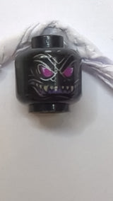 Minifigur, Alienkopf mit magentafarbenen Augen, dunkelviolettem Grinsen mit scharfen Zähnen und goldenem Wirbelmuster auf dem Rücken schwarz