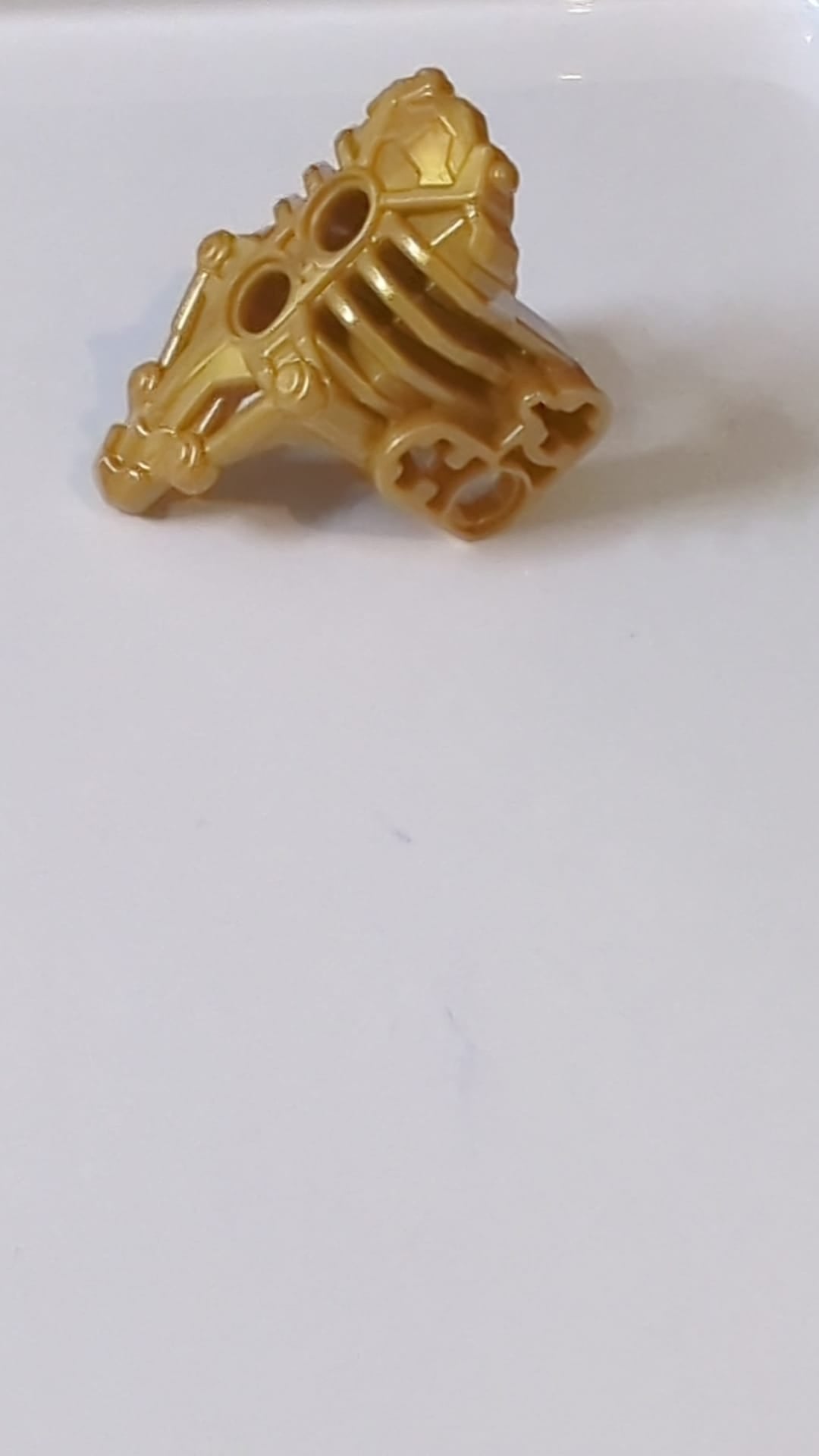 Bionicle Armor Uniter mit 2 Stiftlöchern vorne, Achse und Stiftlöchern an den Seiten pearlgold
