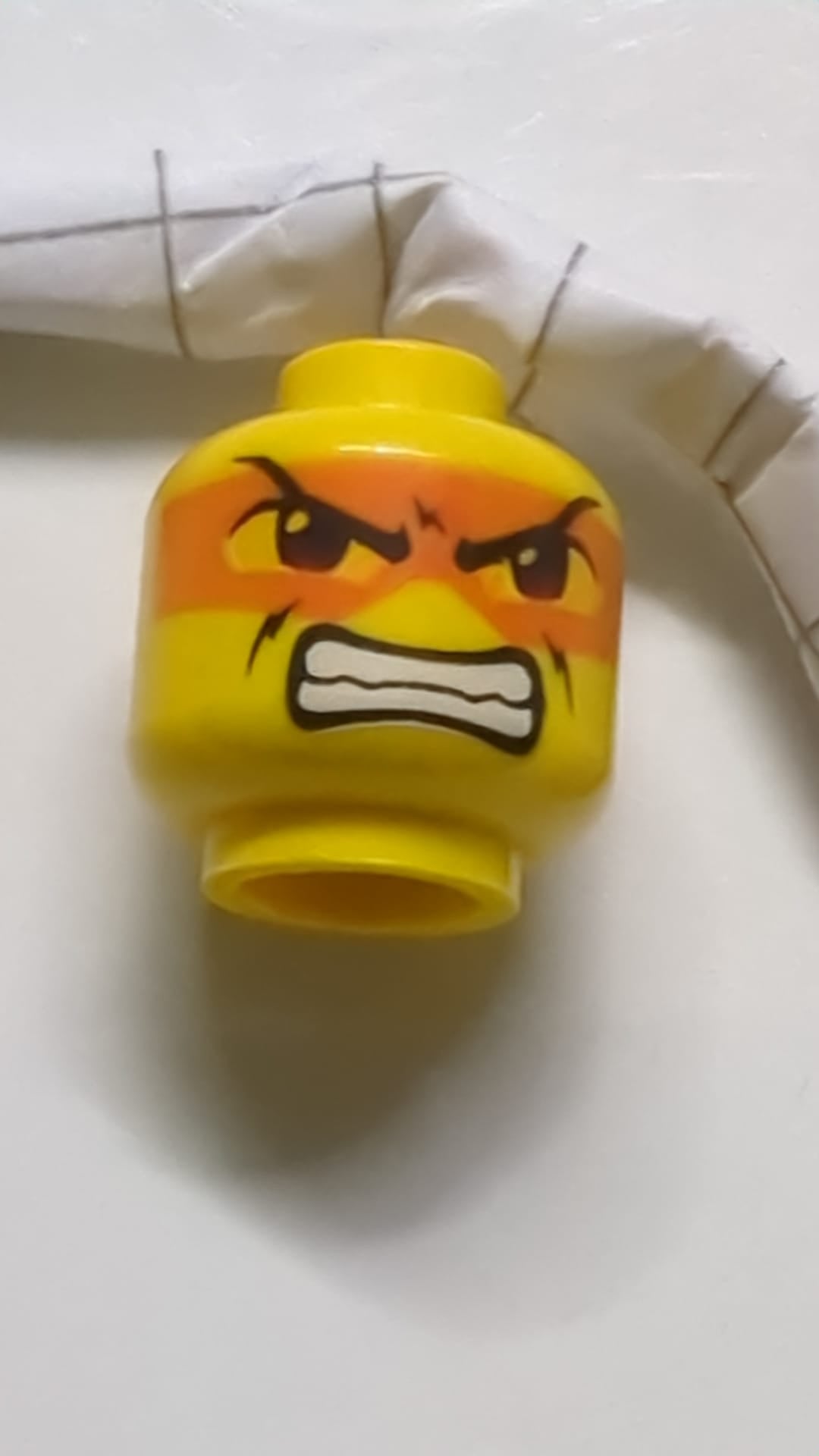 Minifigur, Kopf doppelseitig Exo-Force braune Augen mit orangefarbener Maske, Mund geschlossen / Zähnemuster "Hikaru" gelb