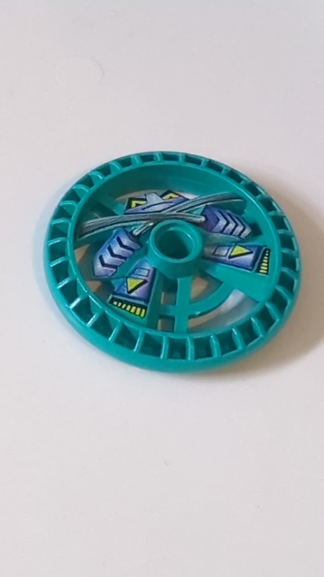 5x5 Technik Disk – RoboRider-Talisman-Rad, Ninja-Form mit Robotermuster türkis