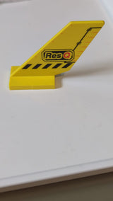 Tail Shuttle mit Res-Q- und Black Lines-Muster gelb
