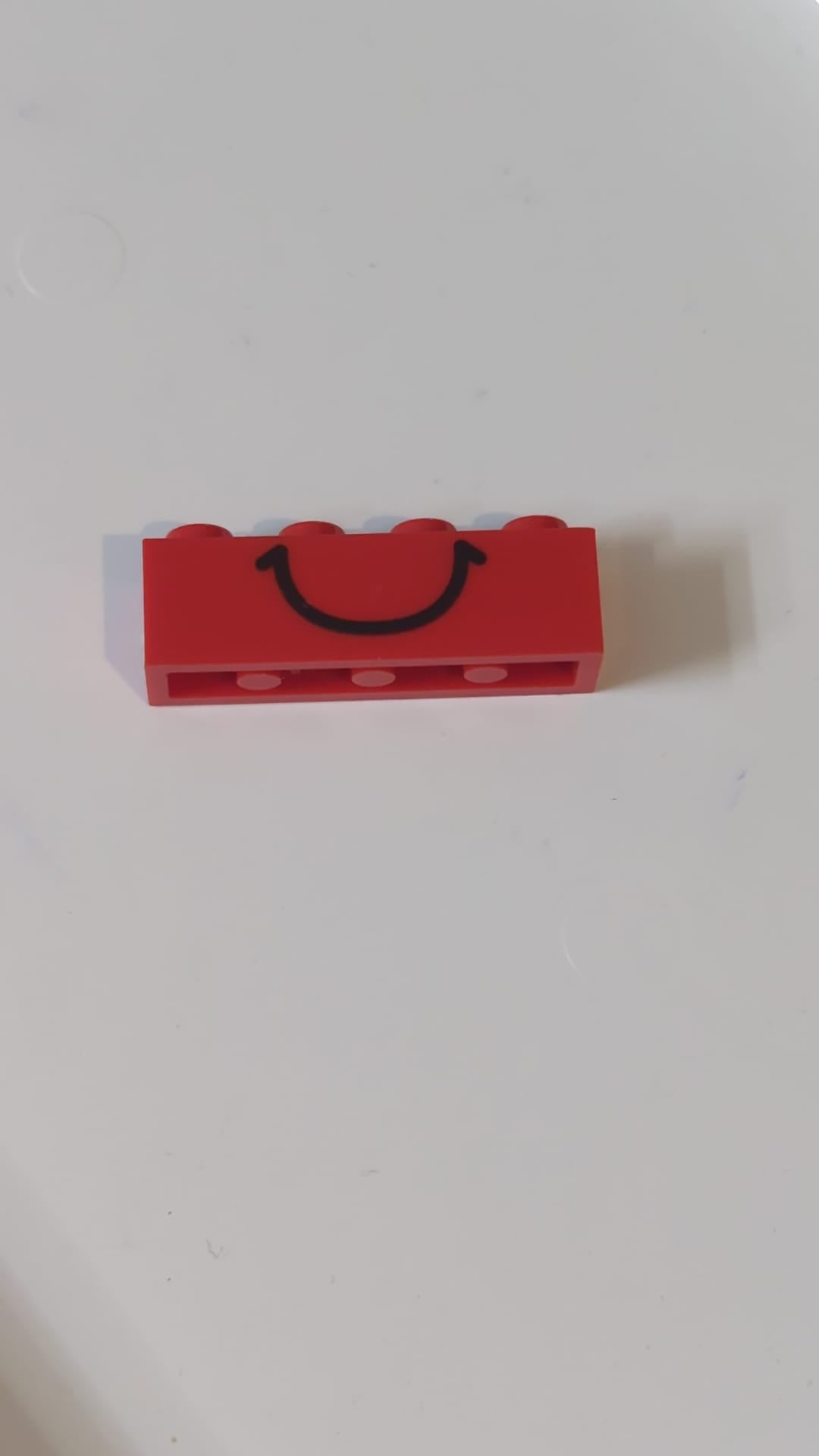1x4 Stein mit Lächeln-Muster rot