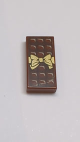 NEU Fliese 1 x 2 mit Nut mit Candy-Bar-Schokoladenblöcken und Muster mit goldener Schleife, neubraun rötlich braun