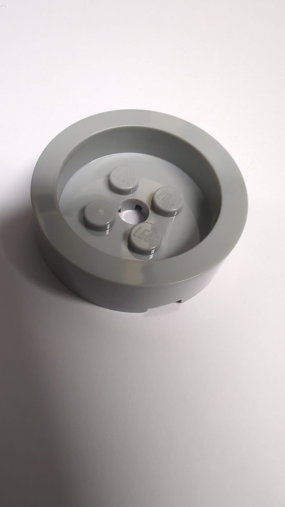 NEU Brick, Round 4 x 4 with Recessed Center and Hole neuhellgrau light bluish gray