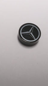 NEU Fliese, rund 1 x 1 mit dunkel-silbernem Mercedes-AMG-Logo-Muster schwarz