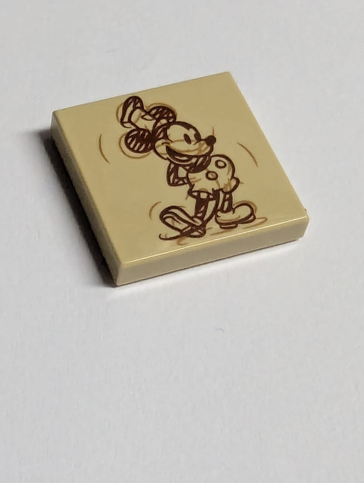 NEU Tile 2 x 2 with Reddish Brown and Medium Nougat Mickey Mouse Sketch Drawing Pattern beige tan
