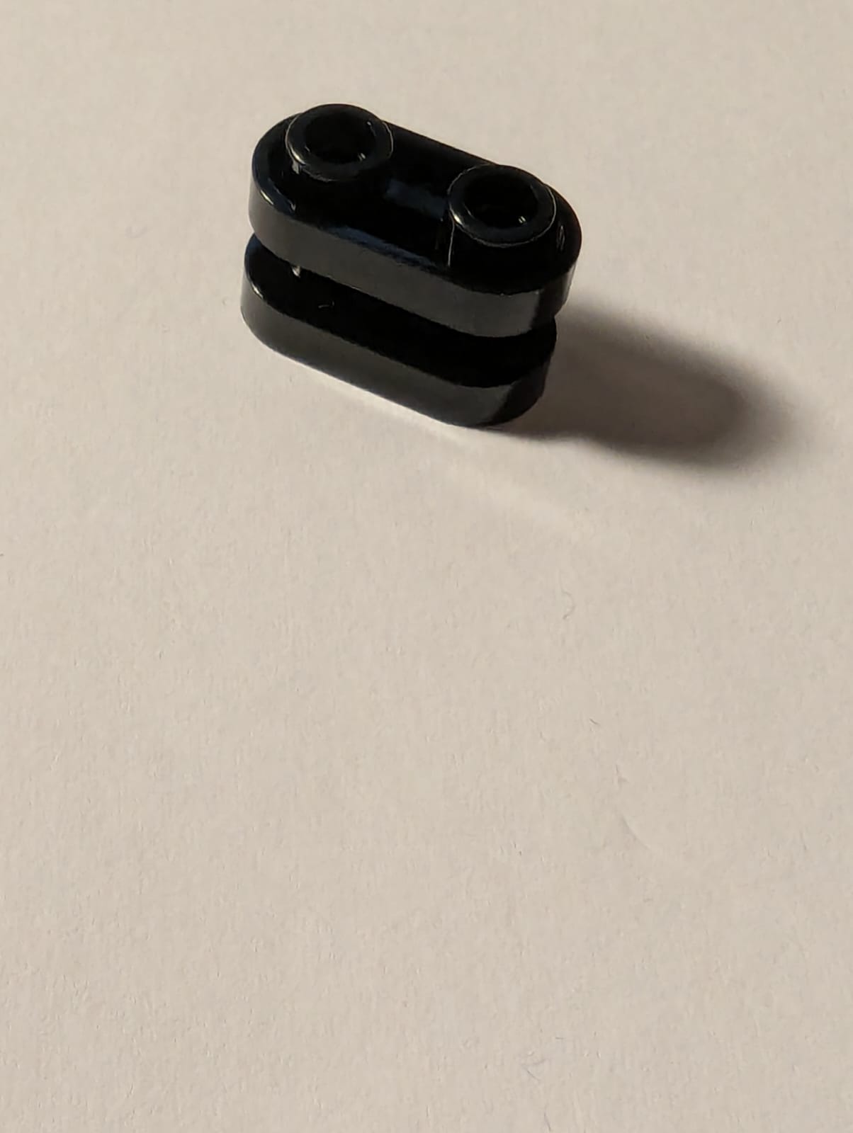 NEU Stein, rund 1 x 2 mit hohlen Noppen und offener Mitte, mit Stäben schwarz