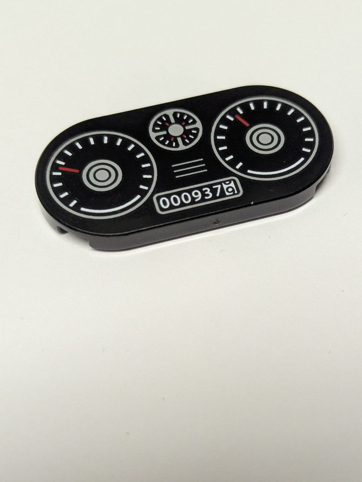NEU Tile, Round 2 x 4 Oval with Vehicle Dashboard, Speedometer, Gauges, and Odometer '0009379' Pattern schwarz black