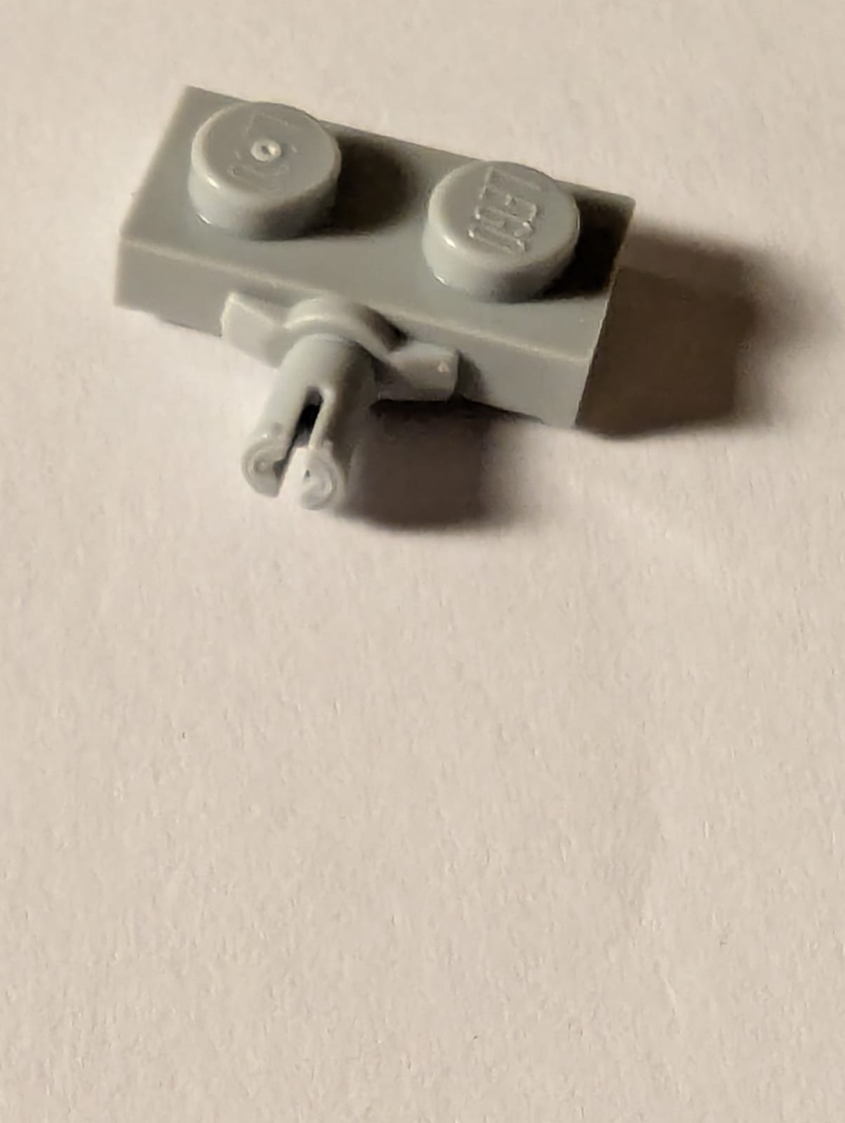 NEU Plate, Modified 1 x 2 with Wheel Holder, Reinforced Underside neuhellgrau light bluish gray
