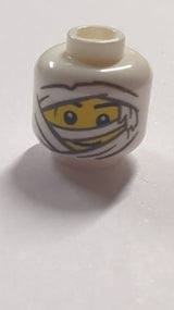 NEU Minifigur, Kopf Mumienwicklungen mit dunkelblaugrauer Umrandung über gelbem Gesicht mit schwarzen Augenbrauen und Grinsen-Muster (BAM) weiß