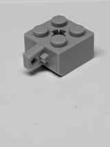 2x2 Scharnierstein verriegelnd mit 1 Finger, vertikal und Achsloch (+ Form) neuhellgrau
