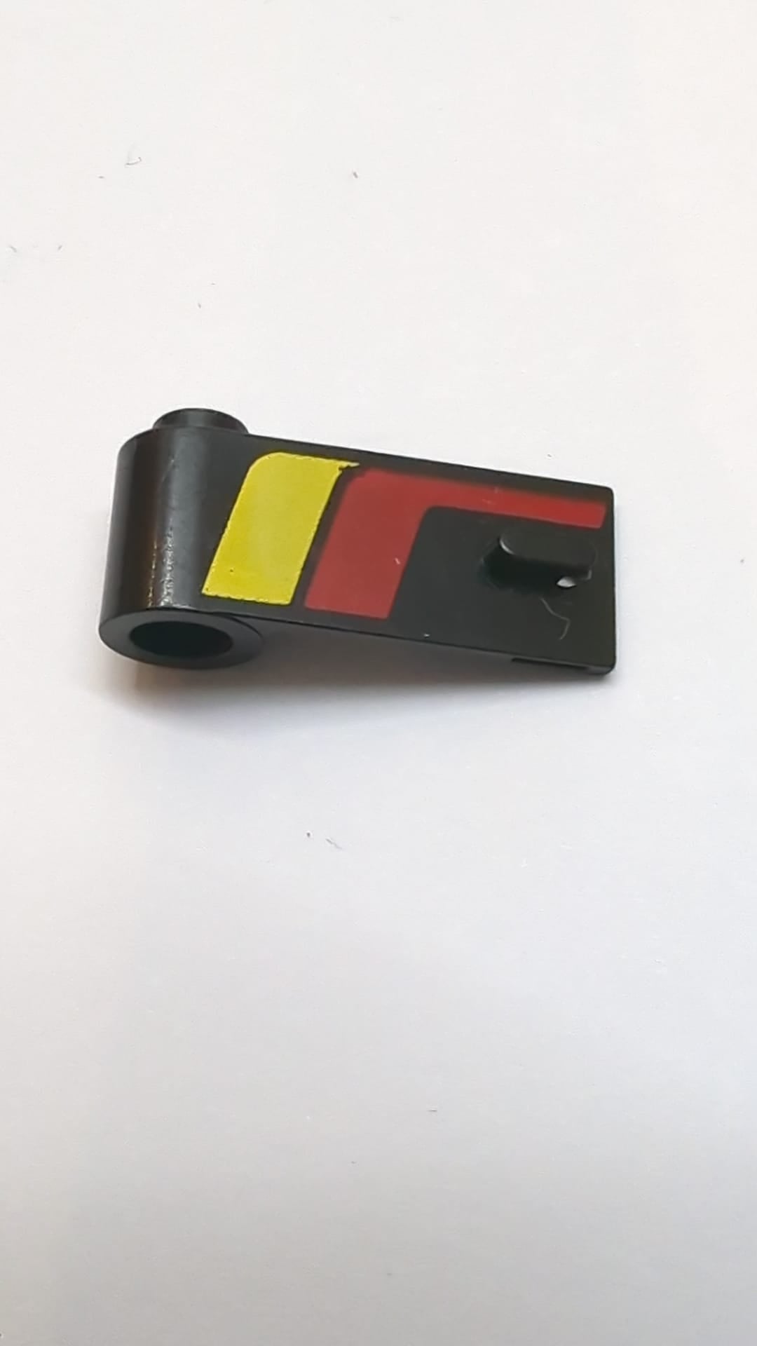 1x3x1 Tür links mit rot-gelbem Streifenmuster schwarz