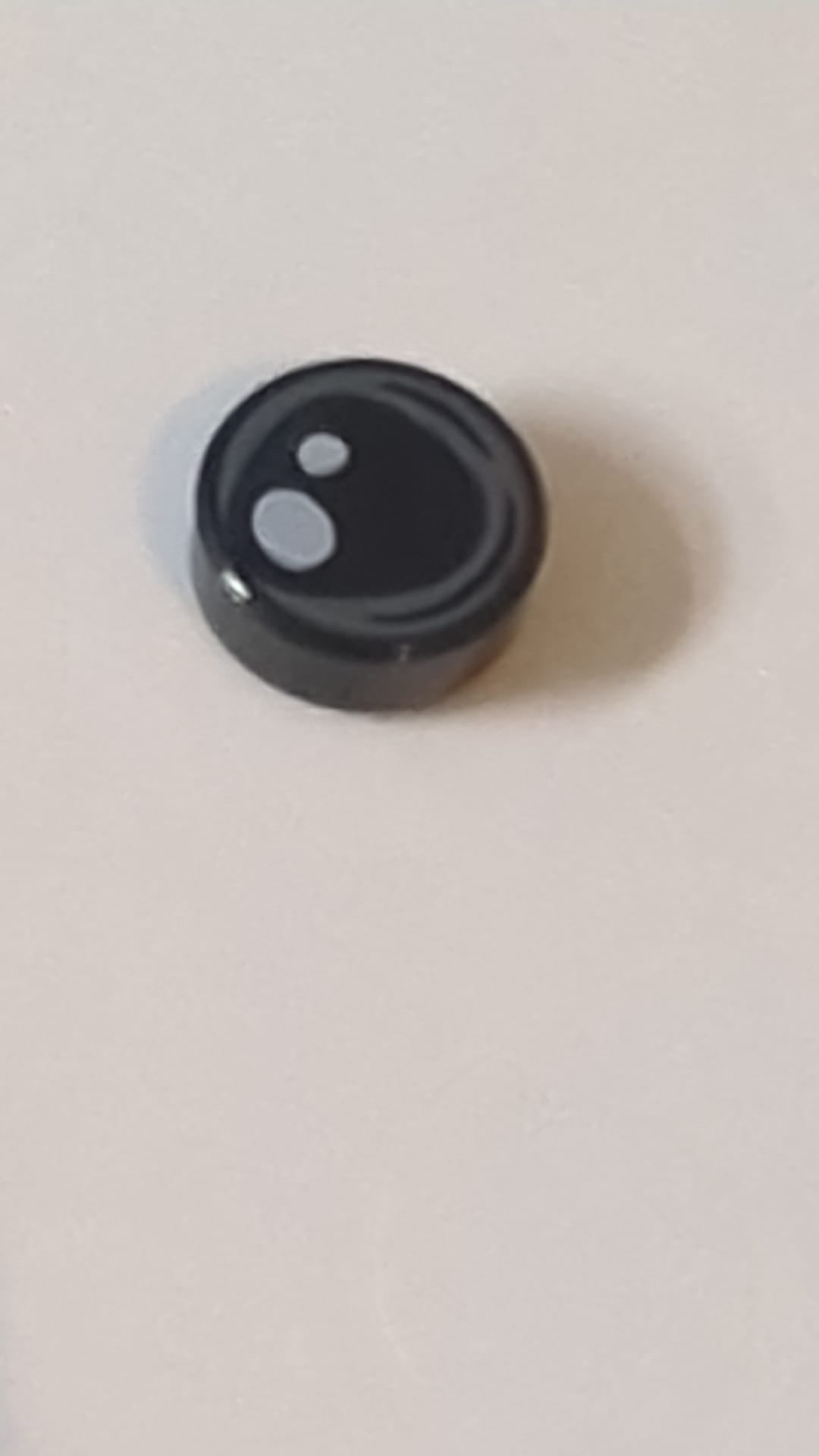 1x1 Fliese rund mit Auge mit 2 weißen Flecken und dunkelbläulich-grauem, unregelmäßigem, kreisförmigem Umrissmuster schwarz