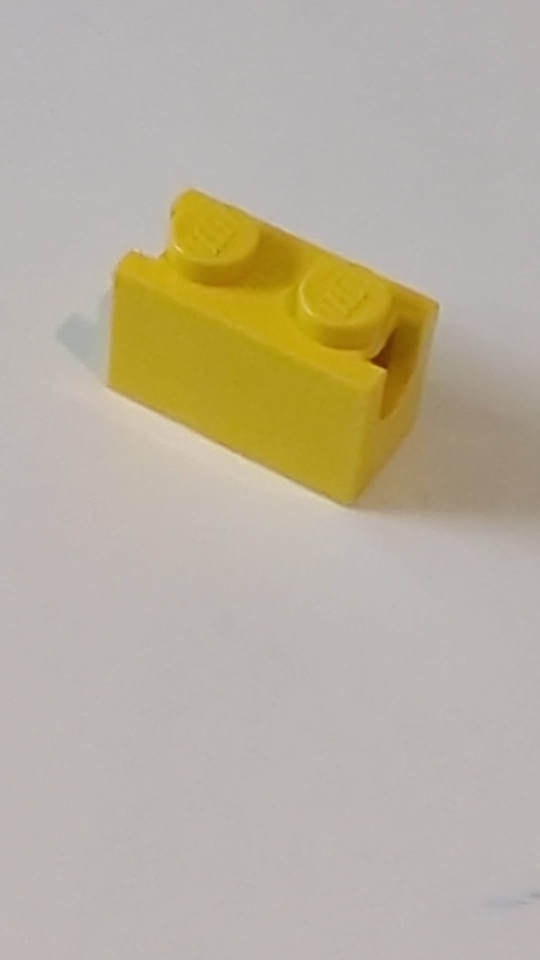 1x2 Modifizierter Stein mit Baggerarmhalterung gelb